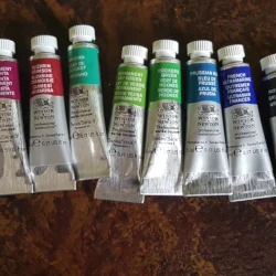 Assortment of watercolour paint tubes from popular brand Winsor & Newton